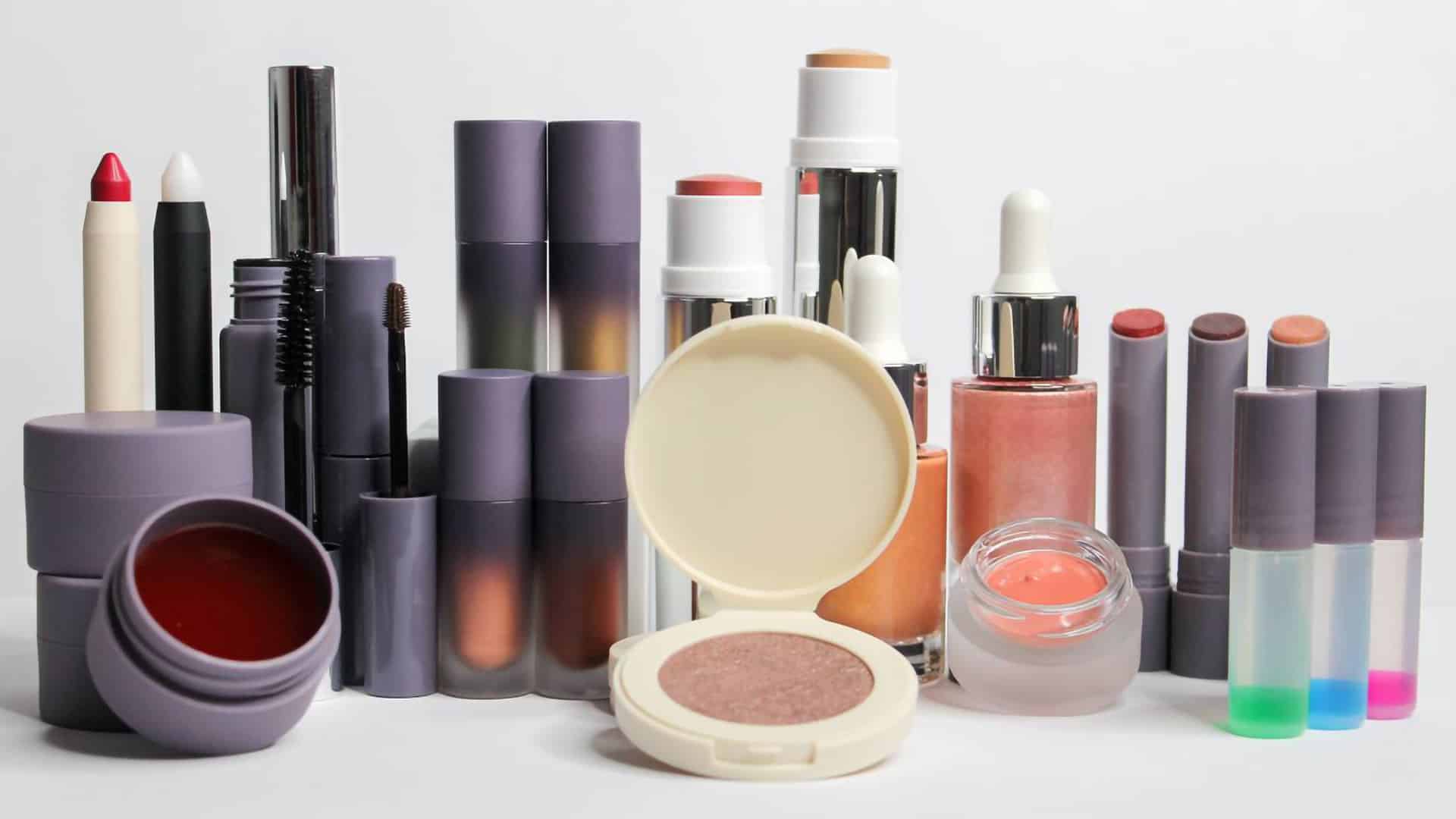 Full vegan makeup collection in colorful packs: sticks, blush, lips, eyeshadows