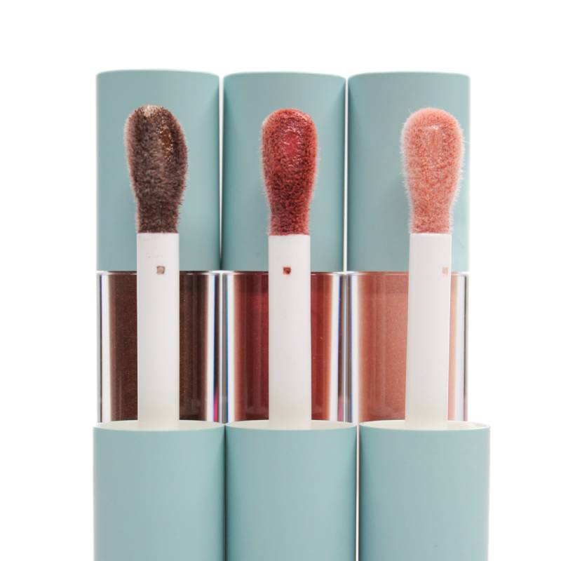 Liquid bronzer, blush, and highlighter with applicators displayed side by side