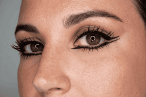 Close-up of defined eyes with bold black eyeliner and mascara